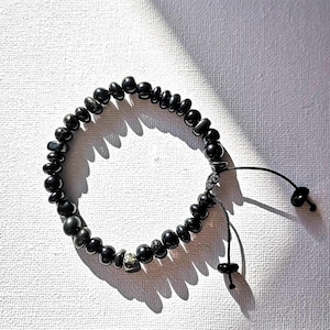 Pulsera de guijarros de shungita: joyería artesanal con protección EMF