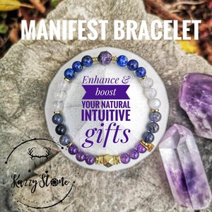 May include: A purple, blue and white beaded bracelet with gold accents. The bracelet is on a white surface with a purple crystal next to it. The text "MANIFEST BRACELET" is at the top of the image. The text "Enhance & boost YOUR NATURAL INTUITIVE gifts" is in the centre of the image. The text "Kazzy Stone Toronto, Canada" is at the bottom of the image.