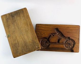 Antique double wooden mold for making fondant, depicting little boy on a scooter, antique bakeware.