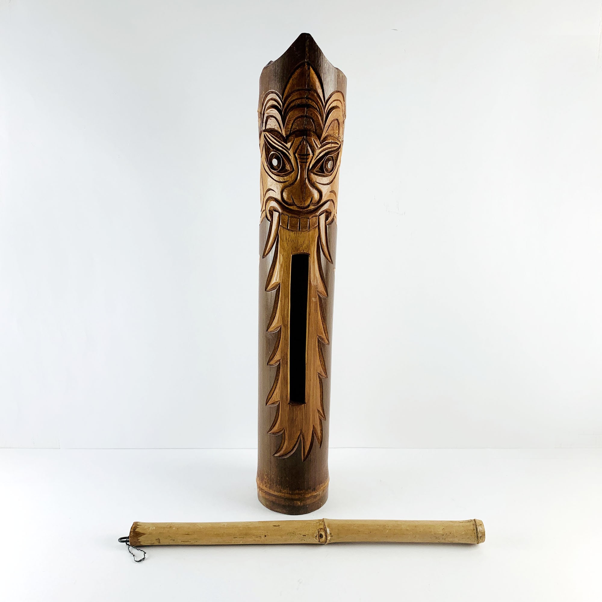 Handmade Bamboo Clapper With Stick, Decorated With a Barong Face, Often ...