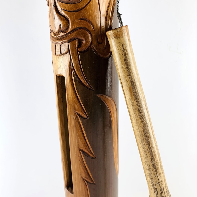 Handmade Bamboo Clapper With Stick, Decorated With a Barong Face, Often ...
