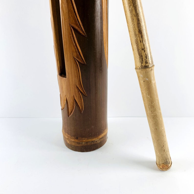 Handmade Bamboo Clapper With Stick, Decorated With a Barong Face, Often ...