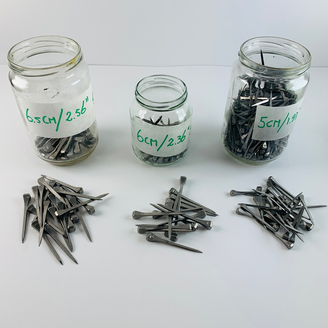 Set of 3 Glass Jars Filled With New Horseshoe Nails in Three Different