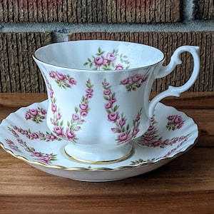 Royal Albert Teacup and Saucer, Pink Brocade, Petite Pink Rosebuds, Montrose Shape, English Bone China, 1960-70s