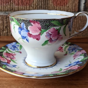 Paragon Teacup and Saucer, Sweet Pea, Pink and Blue Flowers with Black, Fine English Bone China, 1960-63