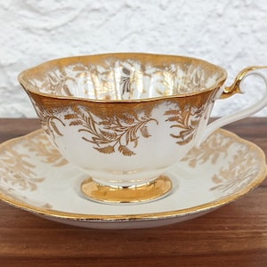 Royal Albert Teacup and Saucer, Heaving Gilding with Gold Leaves, Avon Shape, English Bone China, 1960s