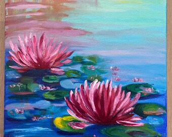 May include: An original painting of a water scene with two large pink water lilies in full bloom. The water is a deep blue with green lily pads and a reflection of the sky above. The painting is on a canvas.