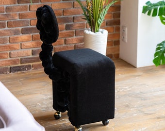 Black chair with a round back
