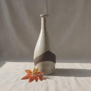 Handmade Raku Pottery Vase: Crackle Glaze Ceramic Art, Black-Necked Decor