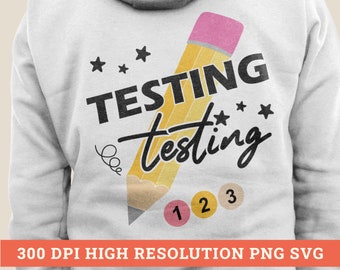 May include: A yellow pencil with a pink eraser and the text "TESTING testing" with three stars and the numbers 1, 2, and 3. This design is perfect for a teacher, student, or anyone who loves to test.