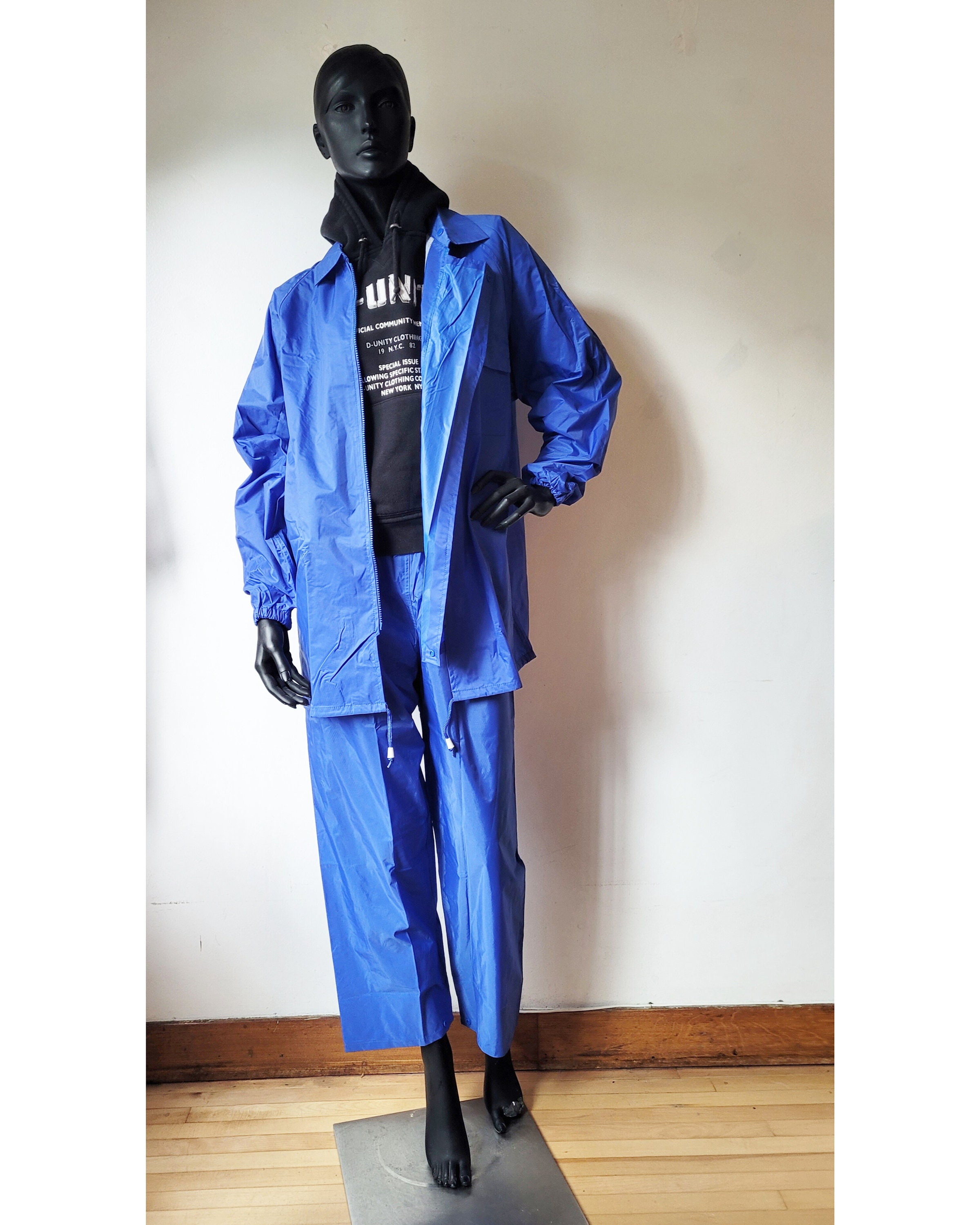 100% Polyester PVC Waterproof Rain Jacket with Pant Bib Hooded Raincoat  Black Rain Suit Wholesale for Fishing Golf Equipment - China Rain Coat and  PVC Rain Coat price