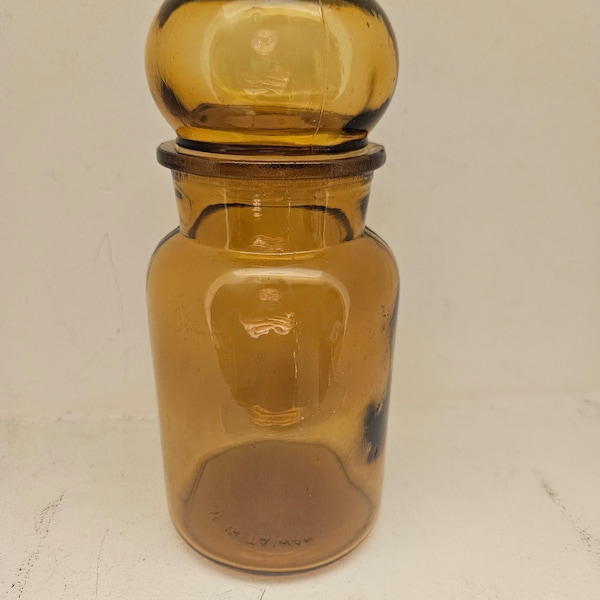 Grote vintage amberkleurige glazen apothekersvoorraadpot