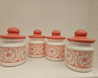 Adorable vintage set of four (4) pink and white cannister set