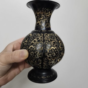 Beautiful and dark etched brass vase