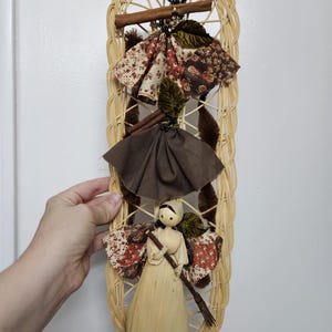 Beautiful vintage corn husk doll wall hanging