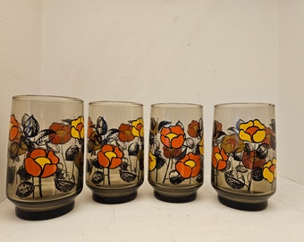 Cute set of four (4) vintage smoky glass and floral drinking glasses