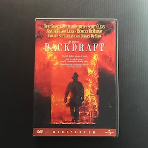 May include: DVD of the movie "Backdraft" with a fiery background and a firefighter silhouette. The DVD case features the film's title and cast, including Kurt Russell and Robert De Niro. The DVD is widescreen.