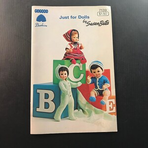 May include: A set of three ceramic mugs with a speckled, matte finish. The mugs are in shades of cream, light gray, and dark gray. Each mug has a simple, minimalist design, perfect for coffee or tea.