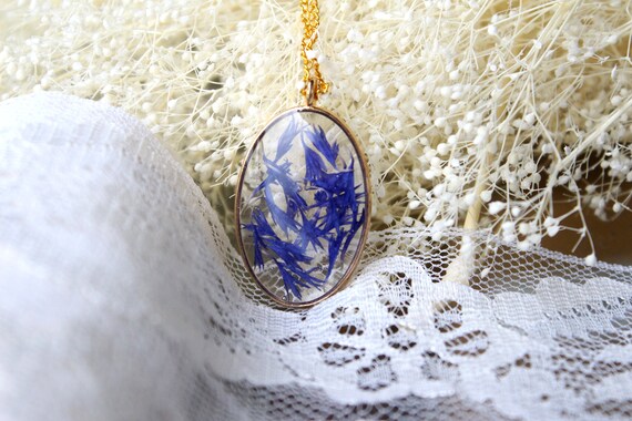 Handmade Blue flowers Floral gift Real pressed blue petals in gold circle pendant with chain Resin Pressed flower Cornflower necklace