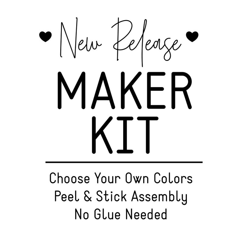 May include: A black and white graphic design with the text "New Release" and "MAKER KIT" with the text "Choose Your Own Colours Peel & Stick Assembly No Glue Needed" below.