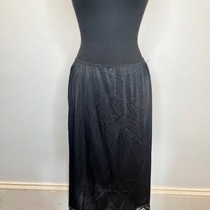 Vassarette black nylon half-slip floral lace hem
