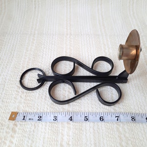 Vintage hand forged iron candle sconce