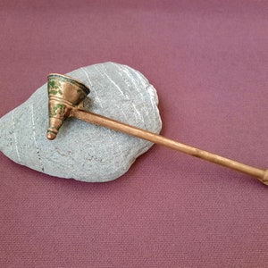 Vintage brass candle snuffer