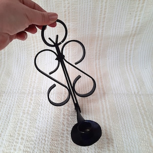 Vintage hand forged iron candle holder