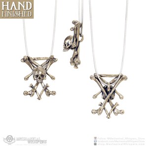 Lucifer Sigil pendant, highly detailed, designed from a 3D scan of an actual human skull and individual bones. Available in 3 metals: blackened steel, brass with a custom patina, and sterling silver with custom patina. 32mm tall.