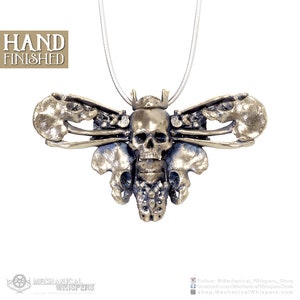 Deaths Head Hawkmoth pendant, highly detailed, designed from a 3D scan of an actual human skull and individual bones. Available in 3 metals: blackened steel, brass with a custom patina, and sterling silver with custom patina. 47mm width.