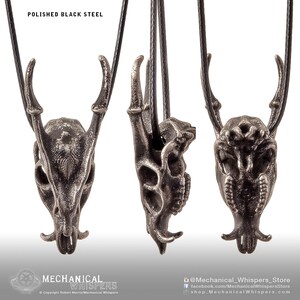 Muntjac deer skull pendant, highly detailed, designed from a 3D scan of an actual muntjac skull. Available in 3 metals: blackened steel, brass with a custom patina, and sterling silver with custom patina. 50mm tall.