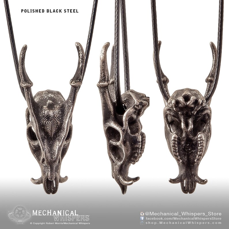Muntjac deer skull pendant, highly detailed, designed from a 3D scan of an actual muntjac skull. Available in 3 metals: blackened steel, brass with a custom patina, and sterling silver with custom patina. 50mm tall.