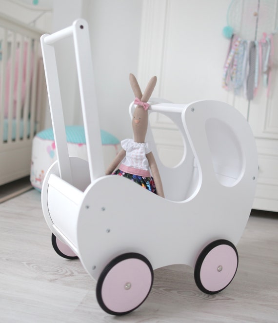 white wooden dolls pram