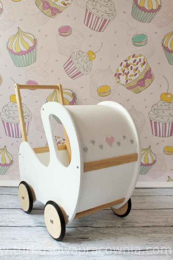 white wooden dolls pram