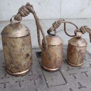 Shabby Chic Rustic Iron Tin Cow Bells 3 Pieces Set Size 6&quot;, 8&quot; & 10&quot; Height Antique Gold Finish Wooden Clapper