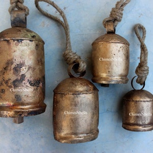 Shabby Chic Rustic Iron Tin Giant Cow Bells 4 Pieces Set Size 4&quot; , 5&quot; , 6&quot; & 8&quot; Height Antique Gold Finish Wooden Clapper