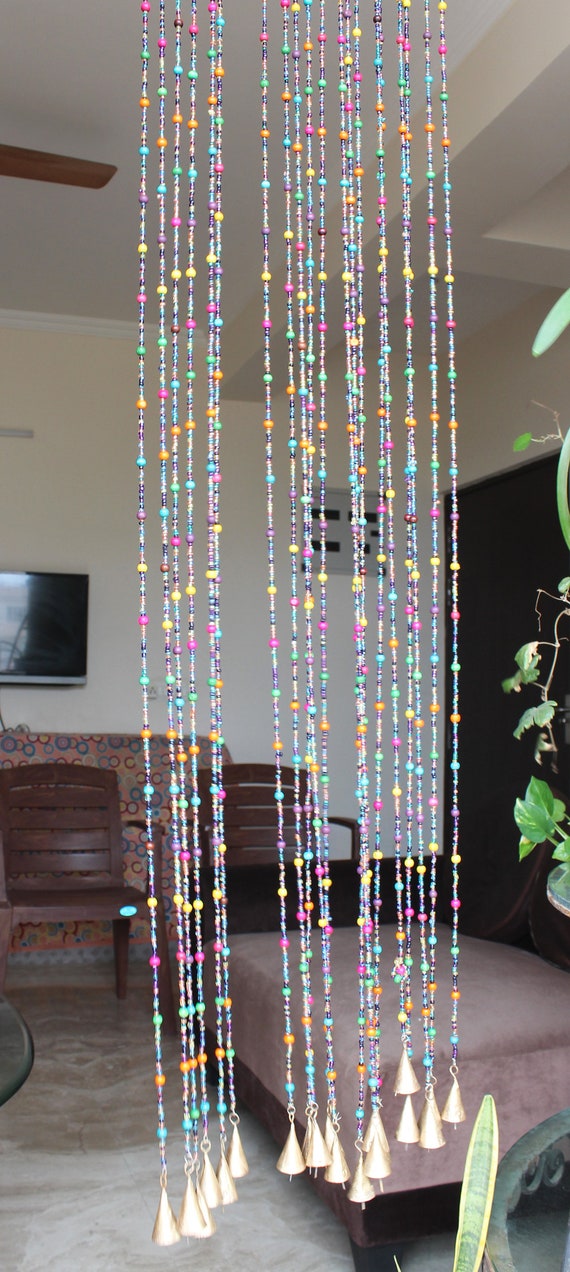 multicolored glass beads with bell multicolored glass beads with bell