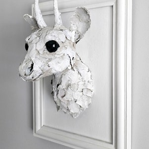 Recycled art pudu image 4