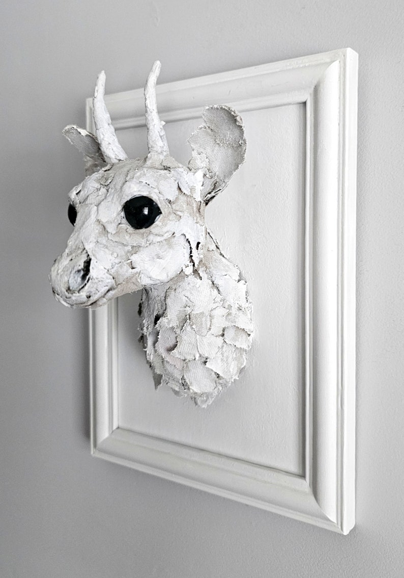 Recycled art pudu image 4