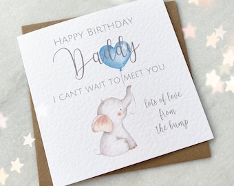 May include: A greeting card with a watercolor illustration of a baby elephant holding a blue heart-shaped balloon. The card reads "HAPPY BIRTHDAY Daddy, I CAN'T WAIT TO MEET YOU, lots of love from the bump."