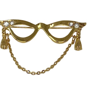 Avon Golden Eyeglass Brooch Pin Holder Tassel Detail Rhinestones