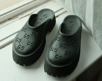 Gucci perforated rubber croc clogs 38