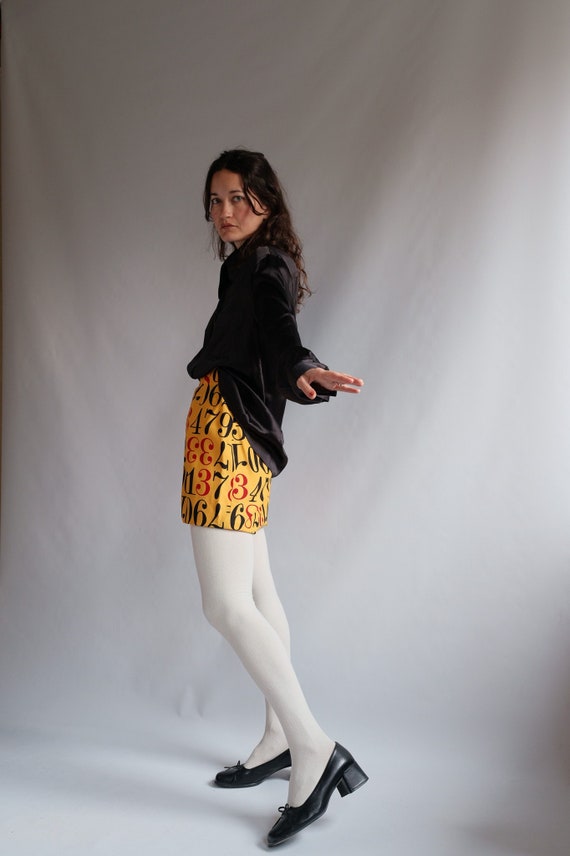 Shape Yellow Crinkle Low Rise Split Mini Skirt | PrettyLittleThing