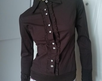 Mono marrón original de los años 80, talla pequeña, nuevo, sin usar.