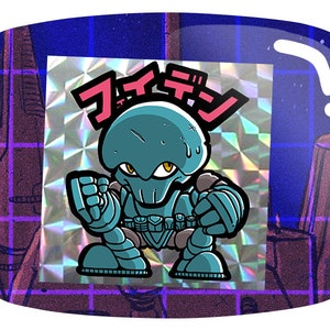 May include: A teal cartoon character with a determined expression, wearing armor and a helmet, is featured on a holographic sticker. Japanese text in pink is above the character. The sticker is set against a purple and blue background with a retro aesthetic.