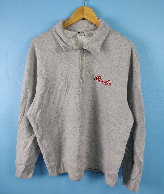 half zip roots sweater
