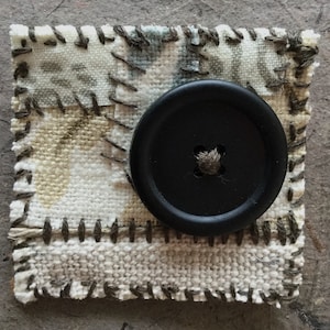 Handmade recycled fabric brooch with button