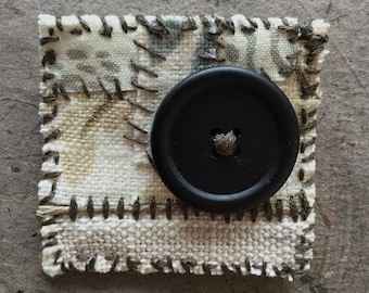 Handmade recycled fabric brooch with button
