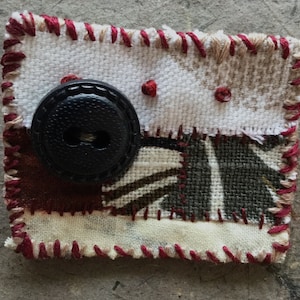 Handmade fabric brooch with button