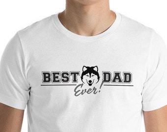 May include: White t-shirt with the text "BEST DAD Ever!" in black, featuring a husky dog illustration. The shirt is worn by a person. The design is centered on the chest.